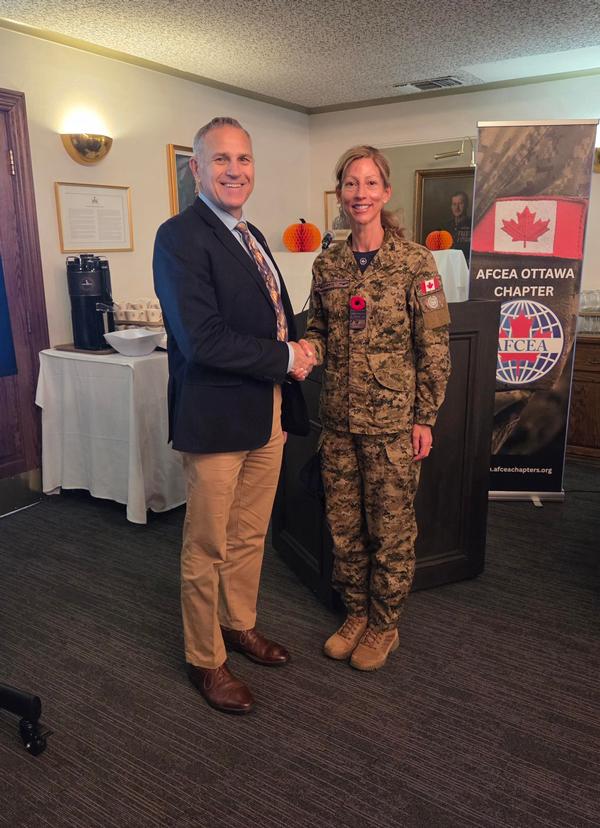 Marchetti and Chapter President Walter Wood pause for a photo during the chapter luncheon in November.