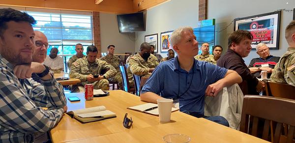 Chapter members and guest attend the chapter luncheon for October 2023, hearing from Col. Rett B. Burroughs, USA, I Corps assistant chief of staff, G6.