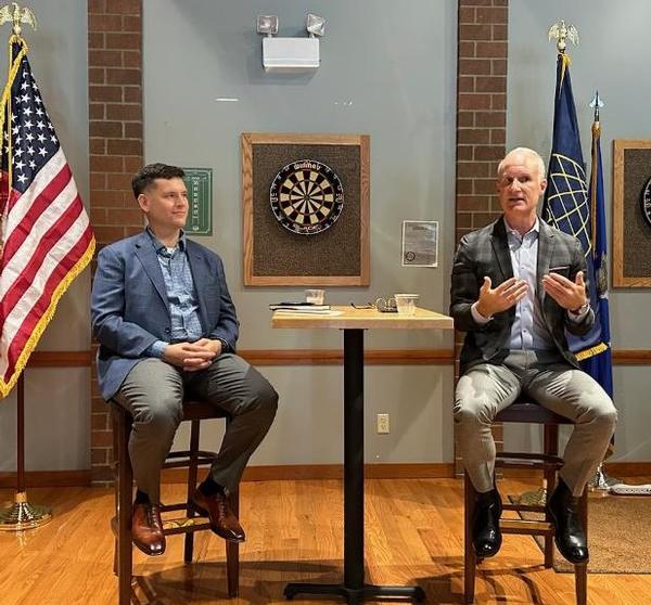 In September, Benjamin Schuppel, chapter member, moderator of the fireside chat, and president of Zero Delta 365 (l), sits with Sean Watts, professor of law, U.S. Military Academy West Point.