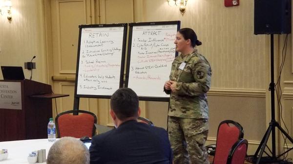Lt. Col. Elizabeth M. Popiak, USA, deputy director, Office Chief of Cyber, U.S. Army Cyber School, acts as the Attract and Recruit chairperson by guiding and collecting key points of the conversation from the group at the January event. 