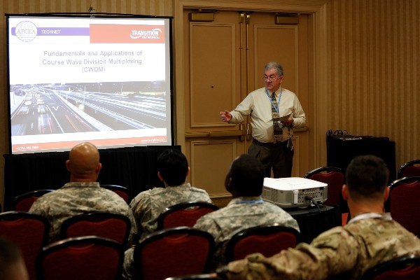 Chapter Vice President Jim Crawford introduces speaker Dennis Troxel of Transition Networks at TechNet Augusta in August.  
