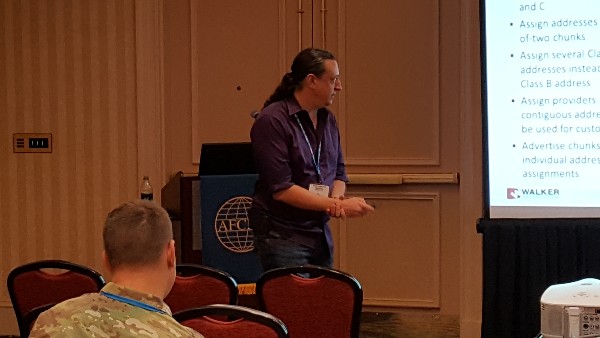 Guest speaker Brandon Ross of Network Utility Force stresses that Internet Protocol version 6 (IPv6) is well on its way to becoming the new worldwide standard for communications on the Internet during a chapter event in July.