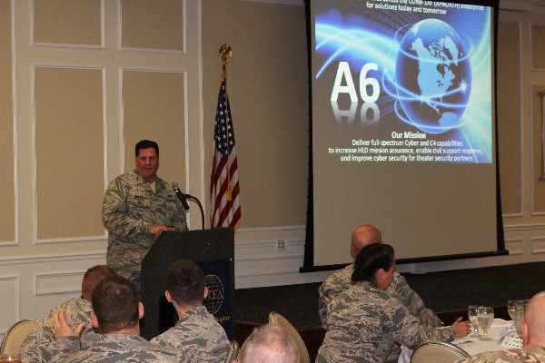 Guest speaker Col. Tony Burris, USAF, director of communications and cyber forces, Continental U.S. North American Aerospace Defense Command Region-1st Air Force addresses attendees at the luncheon in September. 