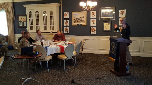 March Lunch and Learn speaker Nicholas Clark, Defense Department senior security engineer at Intel Security/McAfee, reviews his agenda for the lecture.