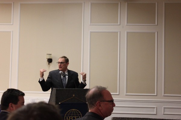 Guest speaker Lt. Gen. Michael J. Basla, USAF (Ret.), highlights some of the goals of AFCEA during a chapter luncheon in March. 