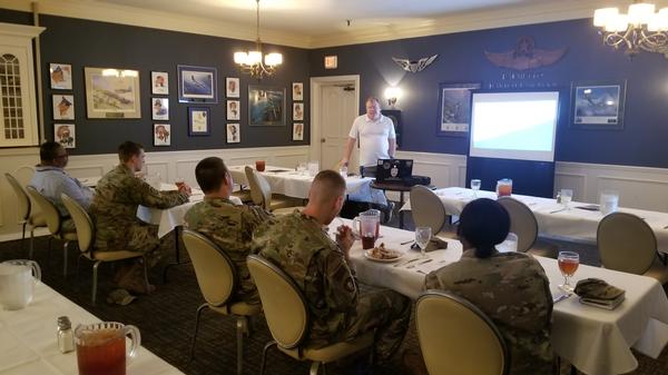 Anthony Pierce, a CISCO investigator working for the Special Operator Joint Special Operation Command, discusses applying known battlefield concepts such as breaking down the language barrier so that everyone is speaking the same language, at the luncheon in November.