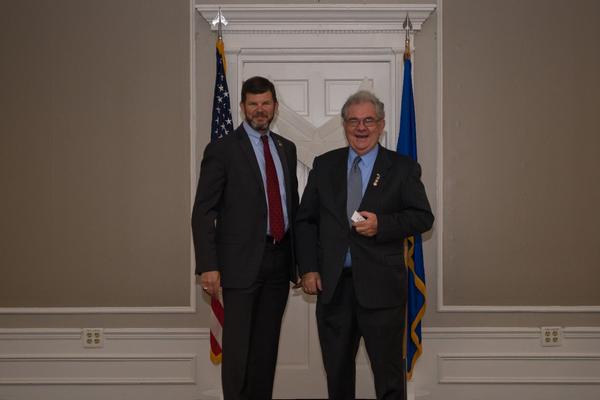 Maj. Gen. Todd McCaffrey, USA (Ret.) (l), is greeted by the AFCEA regional vice president of the North and South Carolina Chapter at the chapter's Spring Luncheon in May. 