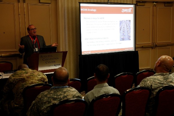 At TechNet Augusta in August, Troxel begins his lecture on fiber optics and how to enhance and increase data throughput with new technologies and new multiplexing techniques. 