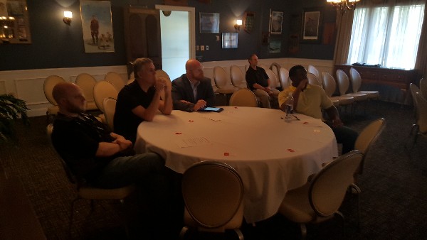 Attendees listen to the October lecture that covered the need to extend infrastructure visibility and consolidate data to enhance threat identification and increase automated threat response. 