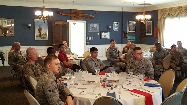 Attendees from U.S. Air Forces Central Command, U.S. Army Central and 20th Communications Squadron listen intently to the March presentation on encryption techniques. 