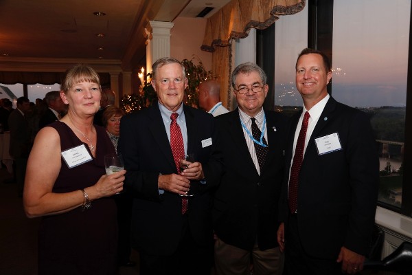 Crawford (2nd from r) enjoys an evening with other AFCEA leaders at TechNet Augusta, including (from l) Jane Brightwell, AFCEA regional vice president, Walker and Associates; Lt. Gen. Robert M. Shea, USMC (Ret.), AFCEA International president and CEO; and Jon Gullett, senior program manager, AT&T Government Solutions. 