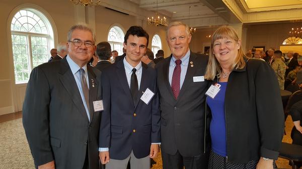 Attending the evening social at the Saint Paul's Church River View Room at TechNet Augusta are (l-r) Jim Crawford, vice president, Palmetto Chapter and his grandson Hayden Crawford, chapter volunteer; Lt. Gen. Robert Shea, USMC (Ret.), president, AFCEA International; and Jane Brightwell, Walker and Associates Inc., regional vice president, North and South Carolina Region.