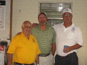 Placing second in the golf tournament are (l-r) Tommy Pearson, Chuck LaMotte and Bob Wiscombe. Proceeds from the October event go to the chapter's scholarship program. 