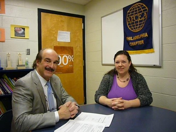 In February, Frank Arlotta, chapter executive vice president, speaks with Tracy Edwards, a science teacher at the Highland Park Program for Success School (Gloucester City, NJ) and recipient of a a $1,000 AFCEA STEM Grant.