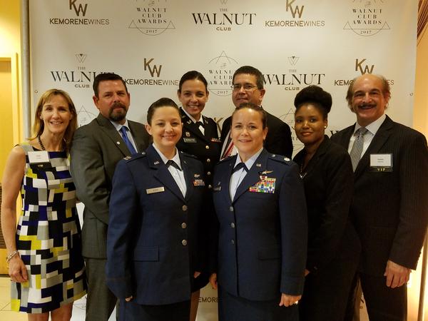 Attending the July Walnut Club Awards banquet honoring local female leaders are (from l) Tina Jordan, AFCEA vice president, membership; Rob Corey, chapter president; Capt. Tanya M. Koch, USAF, director of operations, 436th Communications Squadron; Capt. Jo Anne Schultze, USAR, Judge Advocate General's Corps, and director of operations, USO of Southern New Jersey and Pennsylvania; Chapter Treasurer Mark Meaders; Lt. Col. Stacie A. Rembold, USAF, commander, 436th Communications Squadron; Kristen Davis of Philadelphia's Salvation Army; and AFCEA Regional Vice President Frank Arlotta.