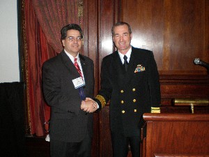 Mark Meaders (l), chapter treasurer and vice president for finance, thanks Rear Adm. Raymond E. Berube, USN, commander, Naval Inventory Control Point, for serving as keynote speaker during the Small Business Conference in October.
