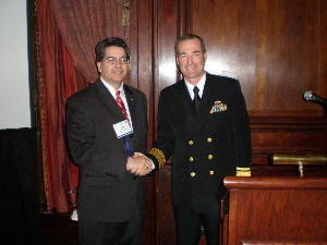 Mark Meaders (l), chapter treasurer and vice president for finance, thanks Rear Adm. Raymond E. Berube, USN, commander, Naval Inventory Control Point, for serving as keynote speaker during the Small Business Conference in October.
