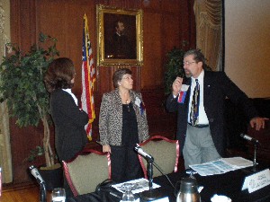At the Small Business Conference in October, Laura Jones (l), director, business development for homeland security, General Dynamics Information Technology; Ludmilla Parnell (c), director, business development for small business partnerships, General Dynamics Information Technology; and Tom Rachfalski, chapter president, discuss the day's events.