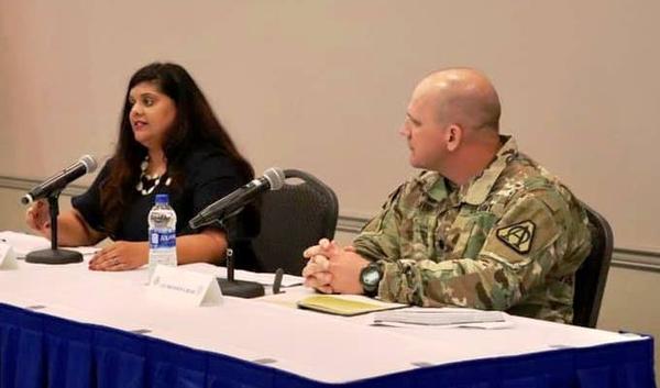 Portia Crowe, cyber electronics activities advisor, Science and Technology, Network Cross-Functional Team, Army Futures Command, and Lt. Col. Brandon Baer, USA, program manager for the U.S. Army's integrated tactical network, discuss the U.S. Army's future network changes at the September luncheon. 