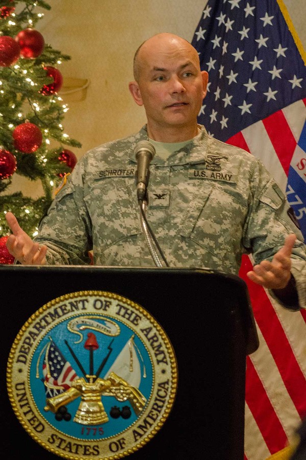 Col. Gerhard Schroter, USA, commander of Tobyhanna Army Depot, delivers a “State of the Depot” presentation to the chapter in December.