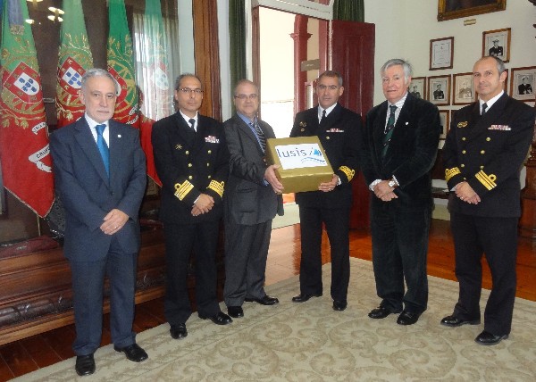 Nuno Paiva (3rd from l), general manager of Lusis Equipamentos e Servicos Lda, presents Cmdr. Castela Repolho (3rd from r), PRT NA, educational director of the Portuguese Navy Technical School, with equipment to support STEM education there. Others gathering for the presentation are (from l-r): Rear Adm. Mario Durao, PRT NA (Ret.), chapter president; Capt. Rodrigues Campos, PRT NA, commanding officer of Escola de Tecnologias Navais; Rear Adm. Carlos Rodolfo, PRT NA (Ret.), AFCEA director and regional vice president, Atlantic Region; and Cmdr. Alcobia Portugal, PRT NA, 2nd commanding officer of Escola de Tecnologias Navais. 