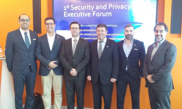 Chapter Vice President Col. Antonio Salvado, PRT AR (3nd from r), welcomes members of the chapter's Cybersecurity Committee to a forum in March.