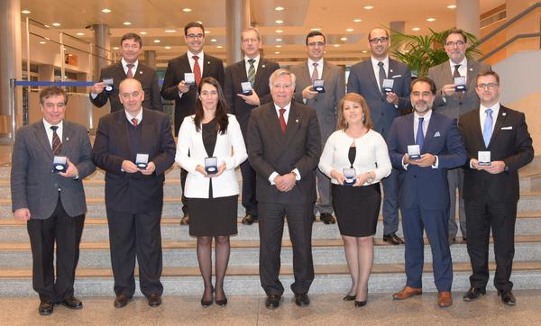 Rear Adm. Carlos Rodolfo, PRT N (Ret.), AFCEA regional vice president (RVP) Atlantic Region and chapter chairman, honors chapter members with the AFCEA RVP Medal for Outstanding Services in 2017 at a February commemoration of the chapter's 30th anniversary. Medal recipients include (front row, l-r) Victor Lobo, Portuguese Naval Academy; Jorge Reis Silva, University of Beira Interior; Lt. Col. Elisabete Vidal, PRT AF, Portugal chapter second vice president; Fatima Medina; Paulo Moniz, Cybersecurity Committee; Pedro Machado, Cybersecurity Committee; (back row, l-r) Col. Antonio Salvado, PRT A (Ret.), chapter first vice president; Joao Annes, Cybersecurity Committee; Pedro Filipe, chapter treasurer; Col. Viegas Nunes, PRT A, commander of the NCISS School Latina; Joao Almeida, Young AFCEAN regional and chapter coordinator; and Cmdr. Pinheiro da Silva, PRT N (ret.), chapter administrative director.