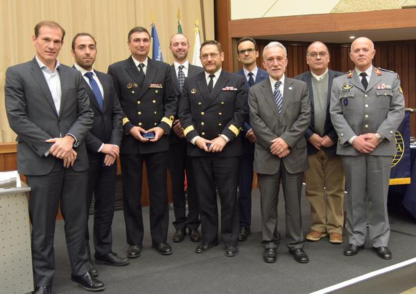 Chapter President Rear Adm. Mario Durao, PRT N (Ret.) (3rd from r), presents the chapter's Medal for Outstanding Services in February to (l-r) Gabriel Coimbra, IDC Portugal; Pedro Sinogas, Tekever; Cdre. Jorge Pires, head of the Directorate of Communications and Information Systems, Portuguese Joint Chief of Staff; Jorge Oliveira, Oracle; Cdre. Bento Domingues, PRT N, information technology superintendent; Brig. Gen. Passos Morgado, PRT AF, head of the Directorate of Communications and Information Systems; Gil Cartaxeiro, ONEbase; and Brig. Gen. Bento Soares, PRT A, head of the Directorate of Communications and Information Systems, Portuguese Army.