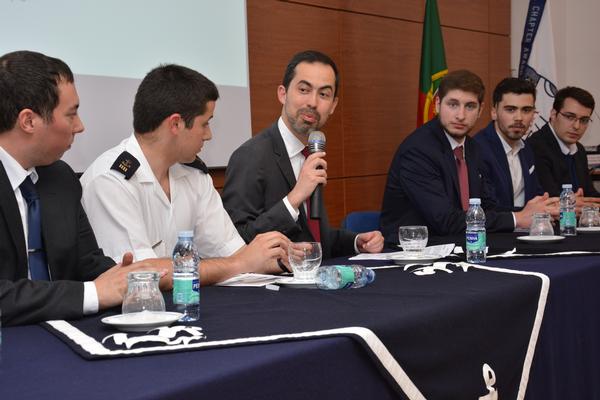 Participating in the debate that followed the student chapter presentations at the May meeting are (c, then l-r) moderator John Rodrigues of INOV INESC Inovation; Tiago Sanches, Covilha chapter president; Francisco Baptista, Almada chapter president; Andre Ranito, Porto chapter president; Diogo Moreira, Porto chapter first vice president; and Pedro Rodrigues, Porto chapter second vice president.