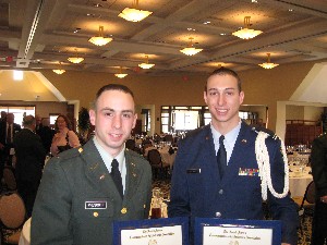 Cadet Michael Prescott, Army ROTC (l), and Cadet Christopher Stewart, Air Force ROTC, are recognized for their acheivements at the chapter awards luncheon in April.