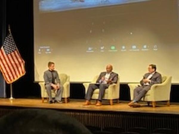 During the January event, (l-r) Cadet Cody Bartman, Col. Black and Lenny Chin, AT&T, discuss 5G dominance.
