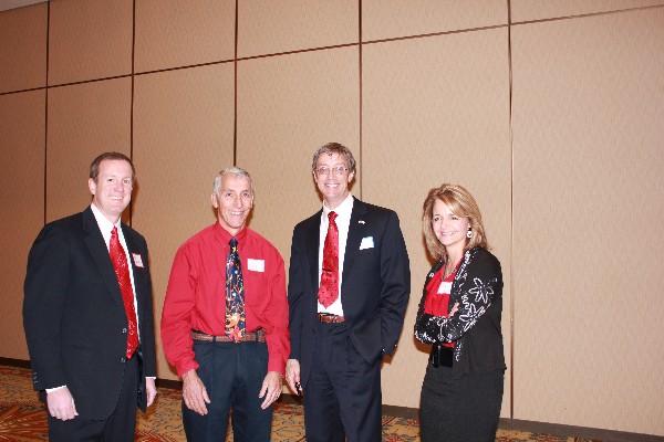 Attending the holiday luncheon in December are (l-r) chapter member Rick Burton, Col. Phil Platt, USAF (Ret.), Col. Fred Mooney, USAF (Ret.), and Gineen Platt, chapter vice president–administration