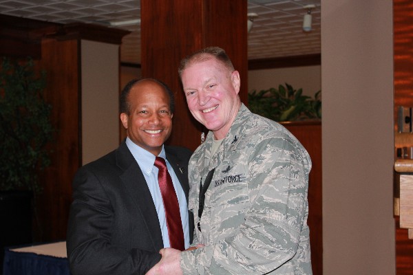 Col. Bob Wright, USAF (Ret.), chapter president, thanks Col. Aaron Smith, USAF, chief, Cyberspace Superiority (Headquarters Air Force Space Command/A-5I), for his informative brief on cyber weapon systems normalization in January.