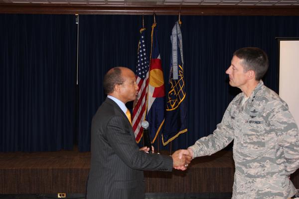 Chapter President Col. Bob Wright, USAF (Ret.) (l), thanks Maj. Gen. Robert Skinner, USAF, for speaking at the November luncheon and supporting AFCEA. 