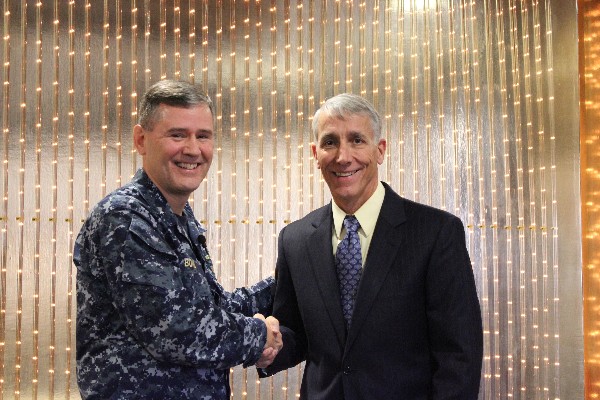 Platt (r) thanks Rear Adm. Thomas H. Hank Bond, USN, director, command and control systems and director of cyberspace operations (J6/J3D), North American Aerospace Defense Command and United States Northern Command, for his remarks at the January meeting.