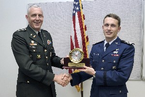 In May, Col. Michael J. Curry, USA (l), chapter president, presented the Lt. Gen. Gordon T. Gould Jr. Award to Cadet 1st Class Bryan T. Freeman, a student at the U.S. Air Force Academy.