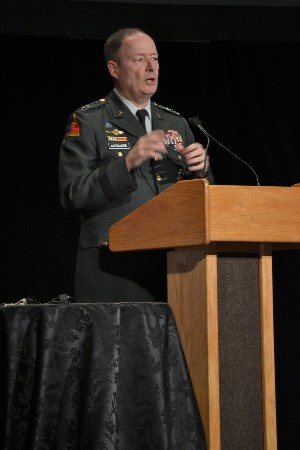 Gen. Keith B. Alexander, USA, commander of the U.S. Cyber Command, and director of the National Security Agency and chief of the Central Security Service, addresses attendees at the chapter's Cyberspace 2011 Symposium in February.