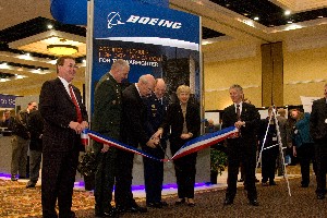 The Cyberspace 2010 Symposium officially opens with a ribbon-cutting ceremony. The January event drew more than 700 attendees and exhibitors.