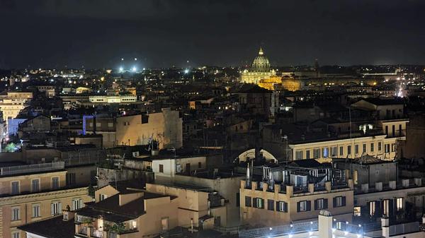 In December, chapter members enjoy a panoramic view of Rome at the year-end dinner.