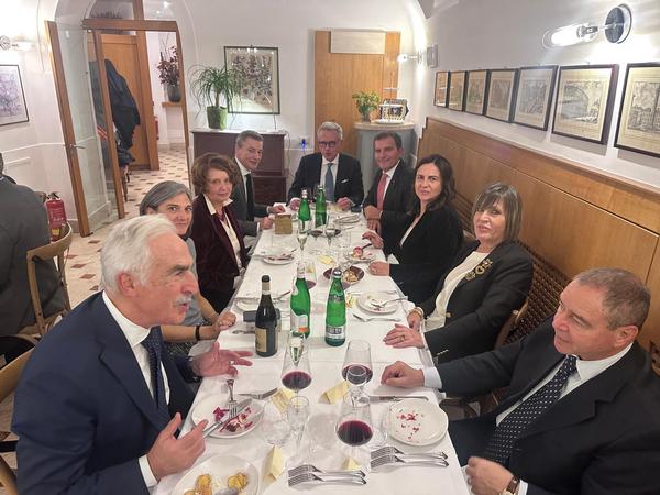 In December, chapter members and guests enjoy a meal together to celebrate the year's end.