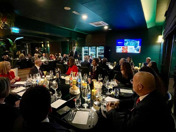 Attendees at the end-of-the-year celebration in November listen to Gen. Tangorra's presentation.