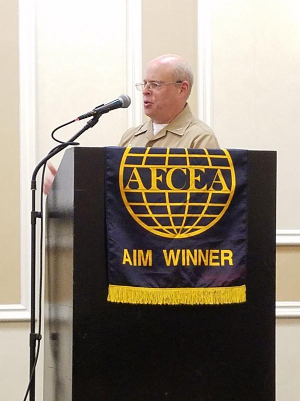 Capt. Kurt Rothenhaus, USN, program manager for the Tactical Networks Program Office, gives a brief on the status of Navy afloat networks at the chapters June luncheon.