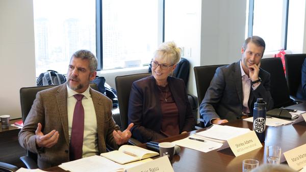 Eric Bassu, chapter member, and Shirley Adams, regional vice president, Southern California, address the Assembly of NATO Parliamentarians in San Diego in October.