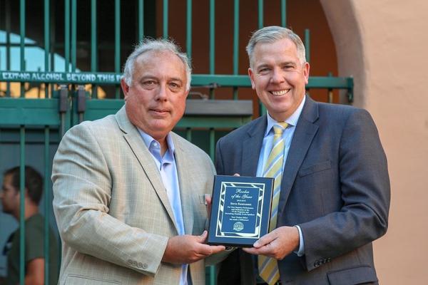 At the September reception, Chapter President Gary Brister (l) presents Steve Rasmussen the Rookie of the Year Award. Robert Morgan won the Jim Loiselle Award but was unable to attend.