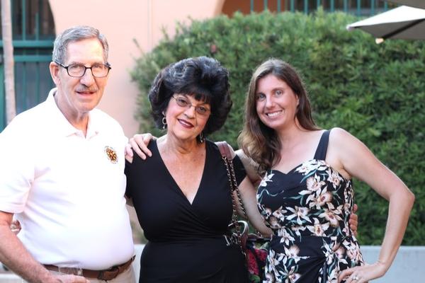 Pat Kelly celebrates the awardees with Jim Loiselle's wife Marilyn Loiselle and his daughter Lori at the September event.