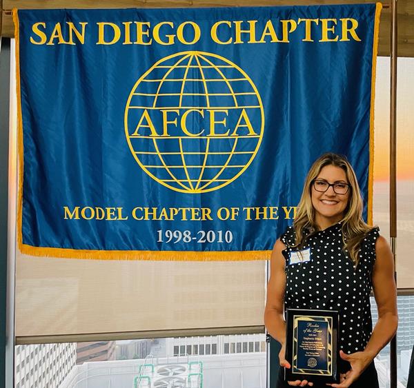 Stephanie Siraco receives Rookie of the Year Award at the chapter's August event.