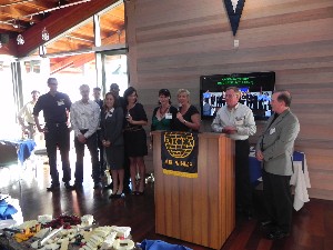 Shirley Adams (3rd from r), former chapter president, thanks the 2010 C4ISR Symposium volunteers at the August reception.