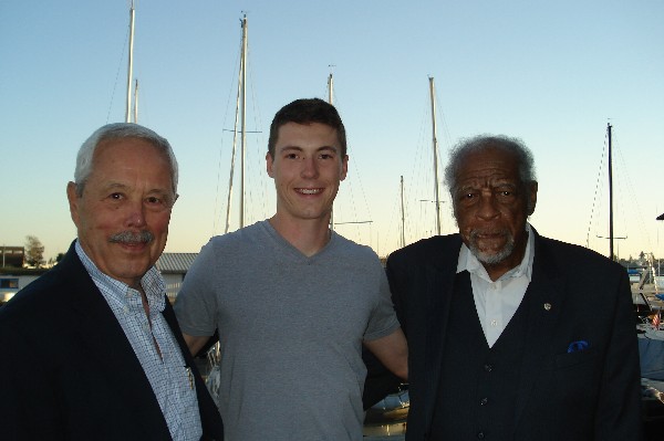 Northern California Regional Vice President Bob Landgraf (l) and Chapter President Dan Washington (r) welcome Ensign Ryan Hub, USCG, at a dinner event in September.   