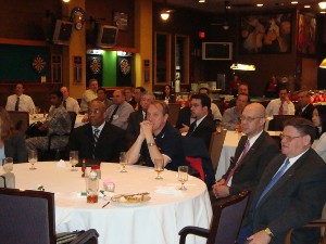 Bradford holds a captive audience during the April chapter luncheon.
