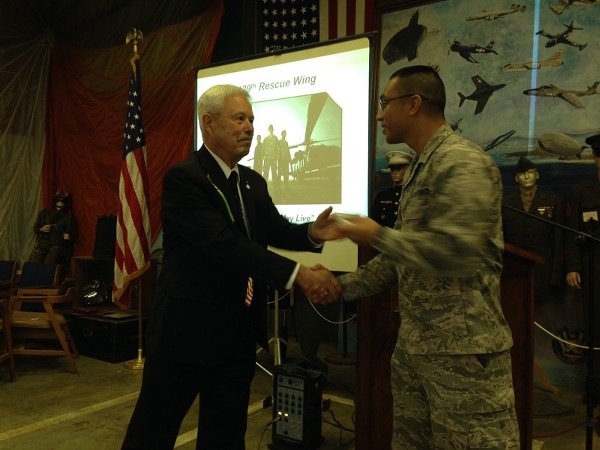 In February, Bob Landgraf (l) thanks 2nd Lt. Roderick Bersamina, ANG, public affairs officer, 129th Rescue Wing, for his informative presentation on the California Air National Guard's 129th Rescue Wing.